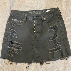 Black ripped jean mini skirt